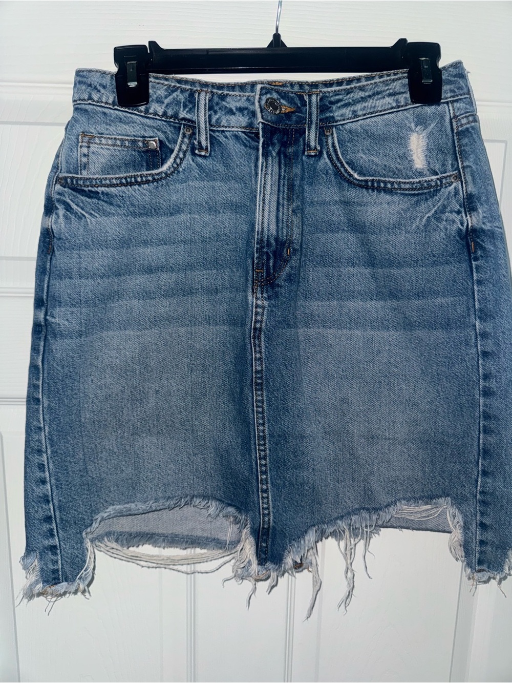 High-Rise Distressed Denim Mini Skirt - Light Blue
